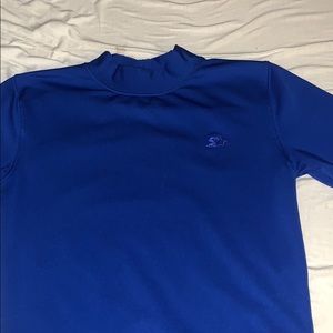 A blue compression starter shirt